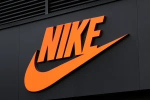 Nike Stock price news and quote featured image showing the bold Nike logo for latest market insights
