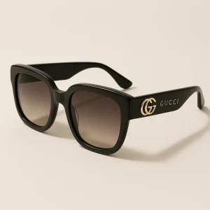 Gucci shades man style with black square frame and gold logo, luxury designer eyewear for bold look